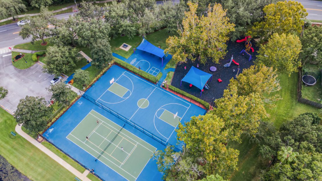 homes for sale in Alafaya Woods Oviedo FL aerial view of tennis courts basketball courts and playground