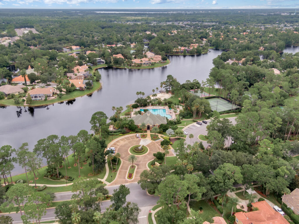 homes for sale Lake Forest Sanford FL clubhouse entrance and lake