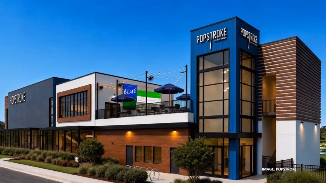 Exterior of the two-story PopStroke building on International Drive in Orlando during the day.