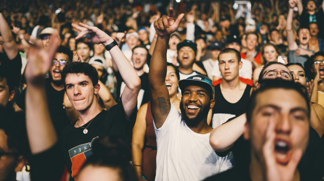 Crowd cheering at a concert, Rolling Loud returns to Orlando in 2027