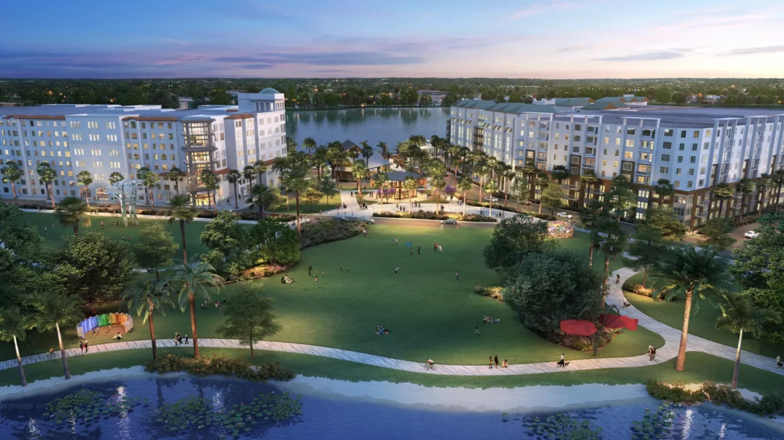 Aerial rendering of RoseArts District clubhouse and lakefront park at dusk in Orlando's Rosemont neighborhood